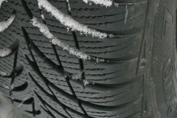 a car tyre in the snow